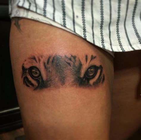 small tiger eye tattoo|Tiger eyes tattoo